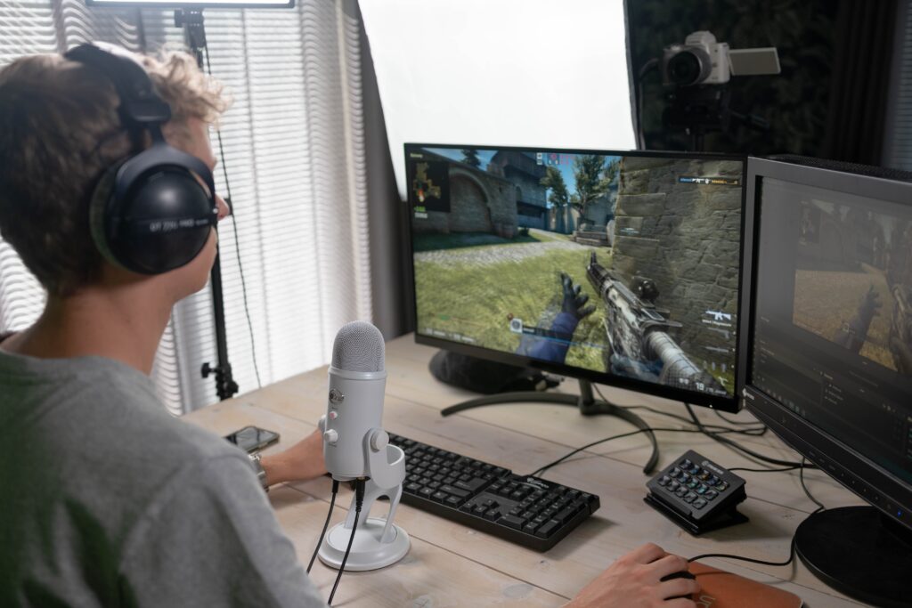 A Live streamer playing a game in front of a streaming setup